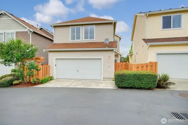 Back of the house, 2 car garage accessed from this large alley