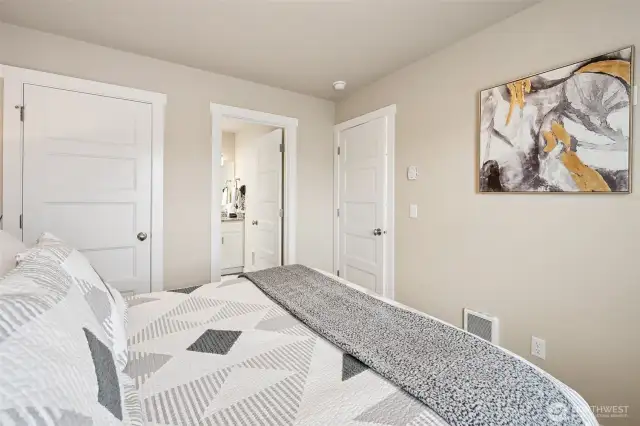 2nd Primary suite with queen size bed.