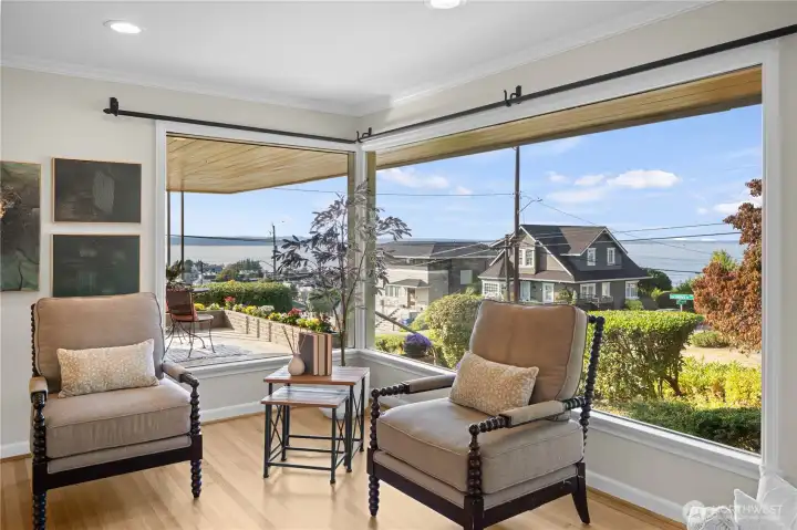 The huge picture windows are perfect for taking in the stunning views, allowing the beauty of the outdoors to become a seamless extension of the interior space.