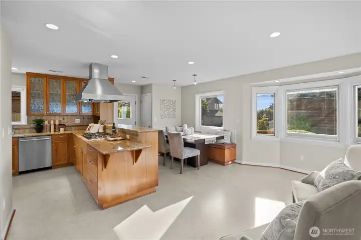 The main floor Chef’s kitchen with built-in banquet seating is perfect for combining functionality with cozy, casual dining.
