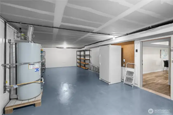 The two-car tandem garage along with ample driveway parking offers both convenience and functionality. Gas water heater replaced in 2023.