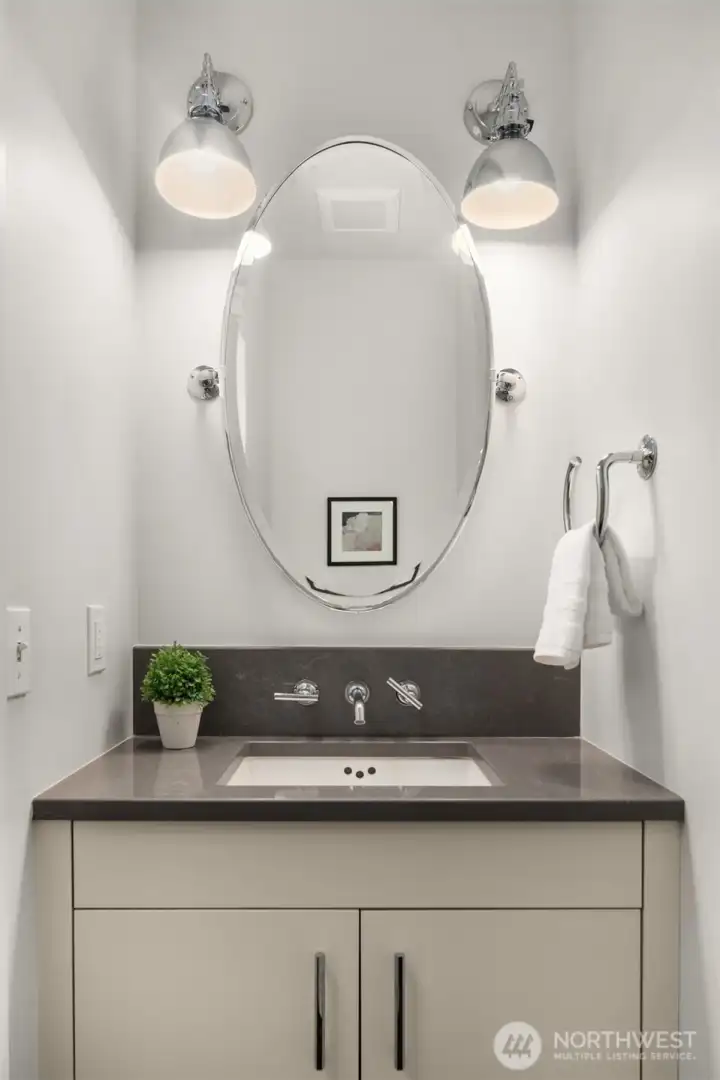 Tasteful powder room off the main hall.