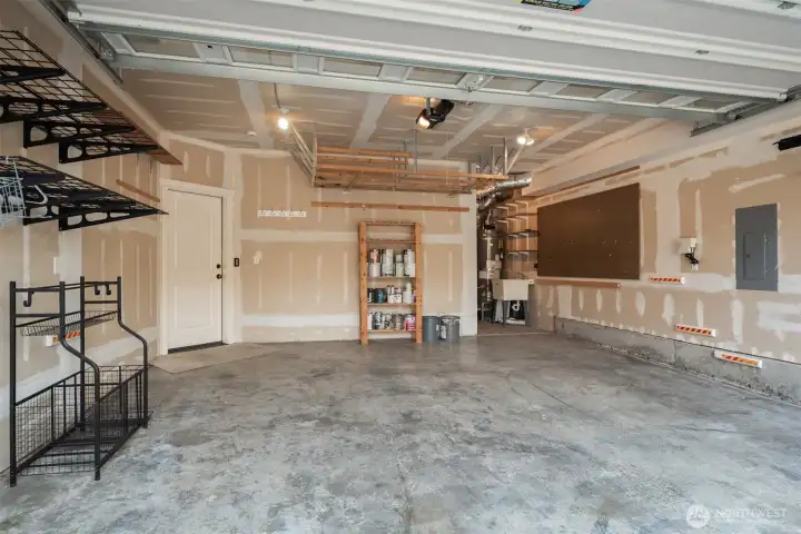 Oversized 2 car garage with lots of smart storage spaces.