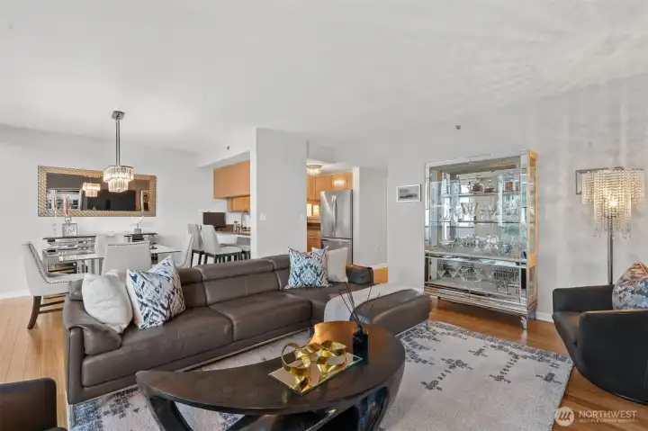 Spacious living area with seamless flow to dining and terrace.