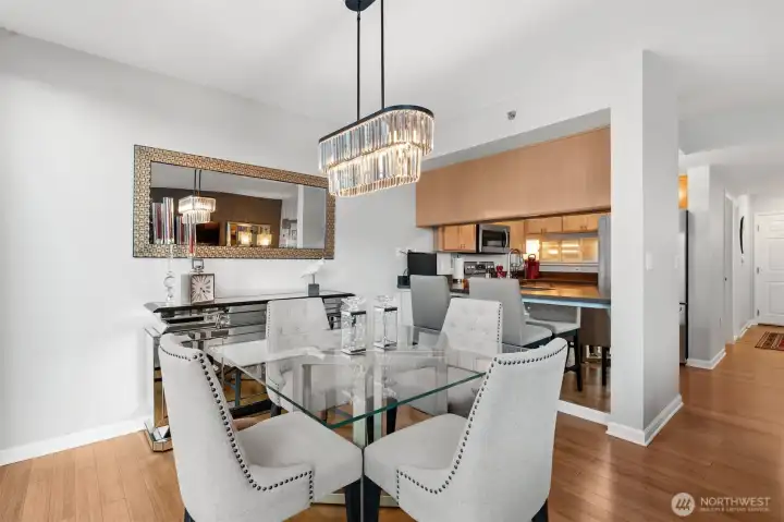 Light-filled dining area adjacent to the kitchen and living space.