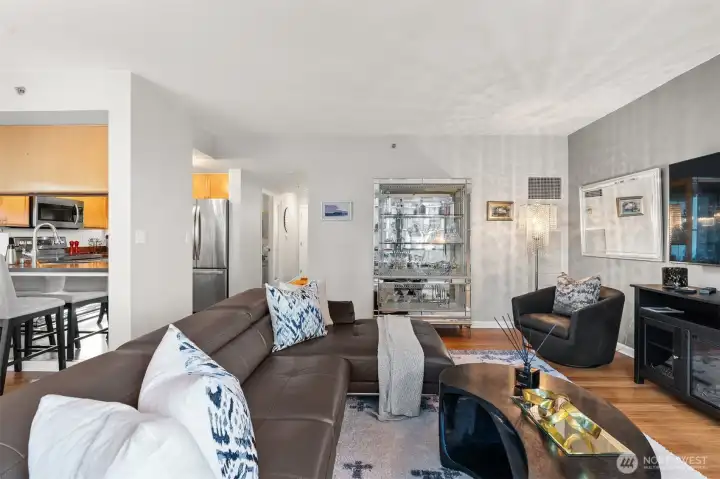 Bright living room with access to oversized penthouse terrace overlooking Downtown Bellevue
