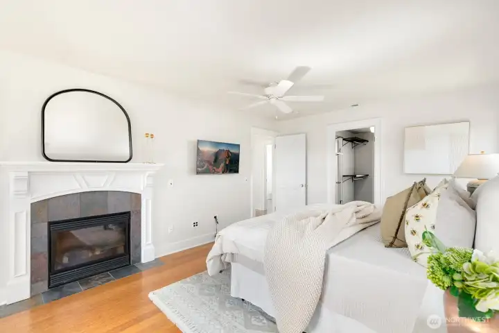 Did I mention there's a gas fireplace in the primary too? Note the door to the closet pictured here.