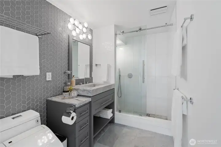 The downstairs suite also feature it's own 3/4 bath