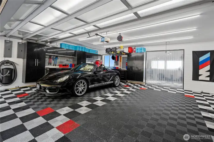 The two car garage was designed for car enthusiasts with all of the bells & whistles - an air compressor, auto-spceific pressure washer, built in vacuum for detailing, and so much more.