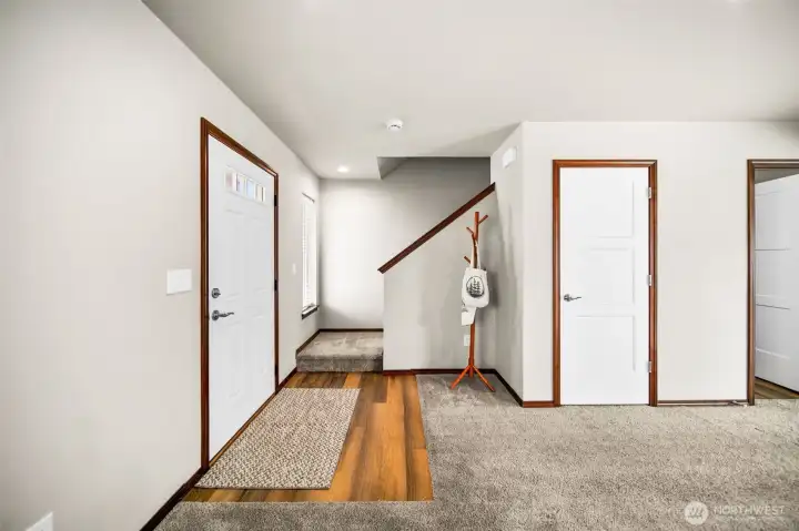Open entry with coat closet.