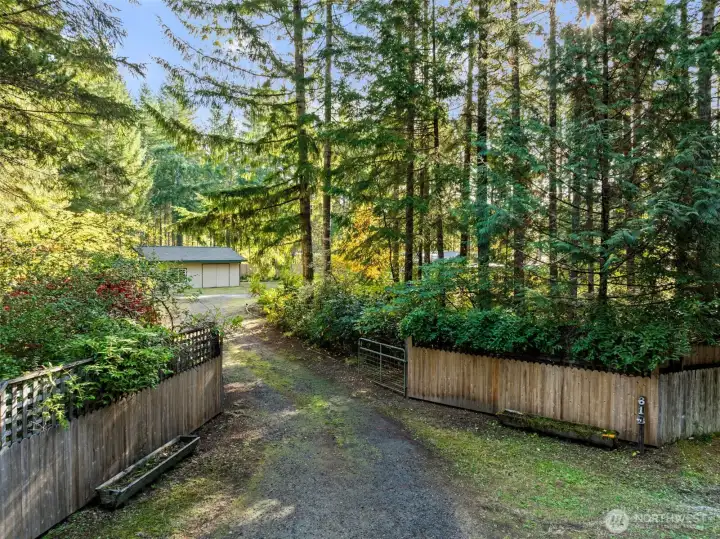 Gated entrance leads to property.