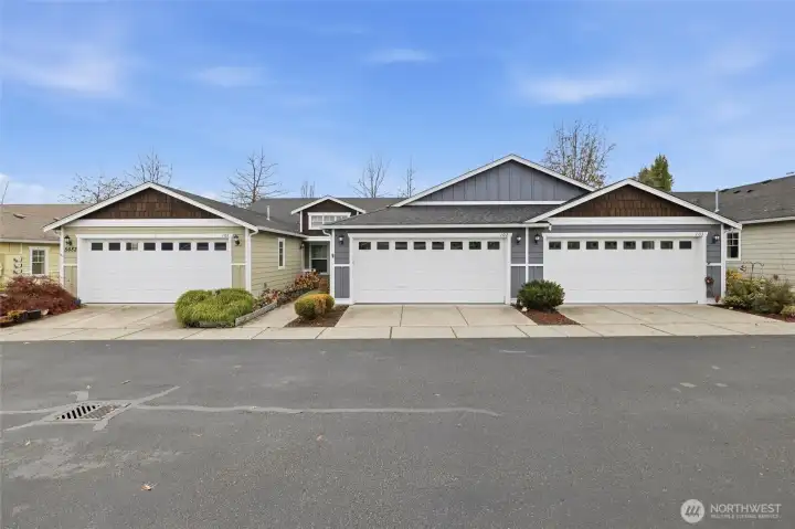 2 car garage. Grey, on the left.