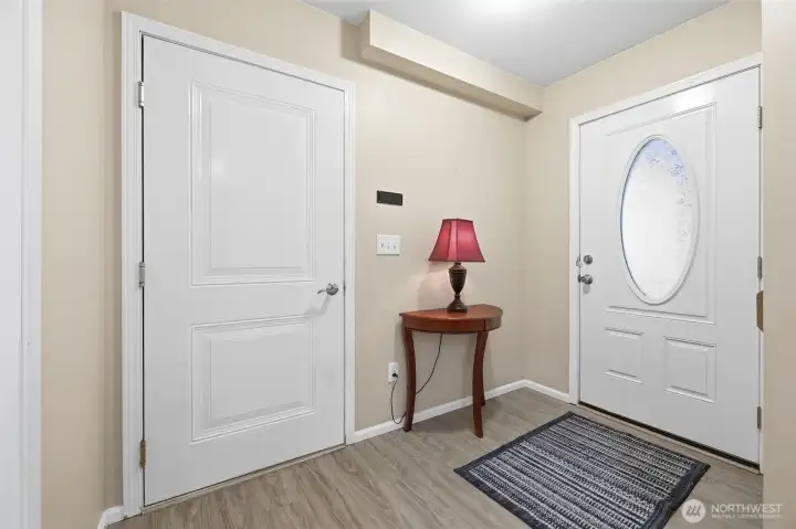 Main door on the garage side. Door to garage.