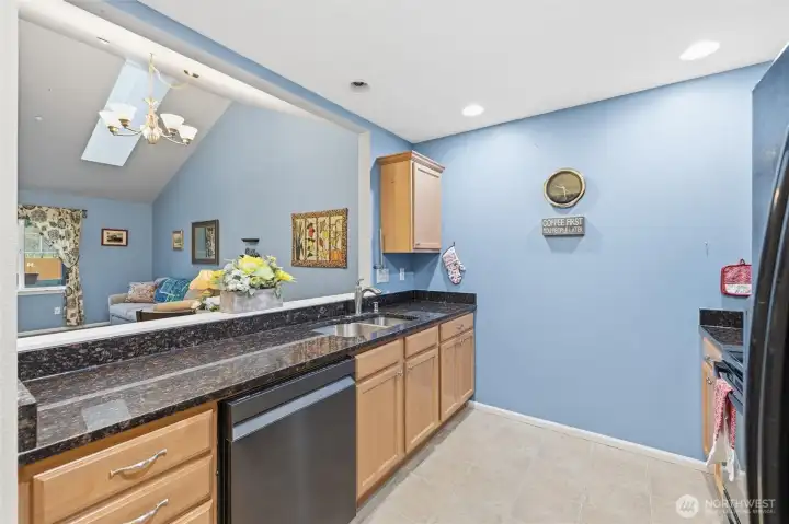 Kitchen, with granite countertops.
