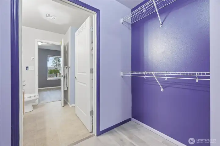 Main bedroom walk in closet and bath.