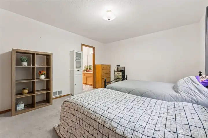 Another view of primary bedroom