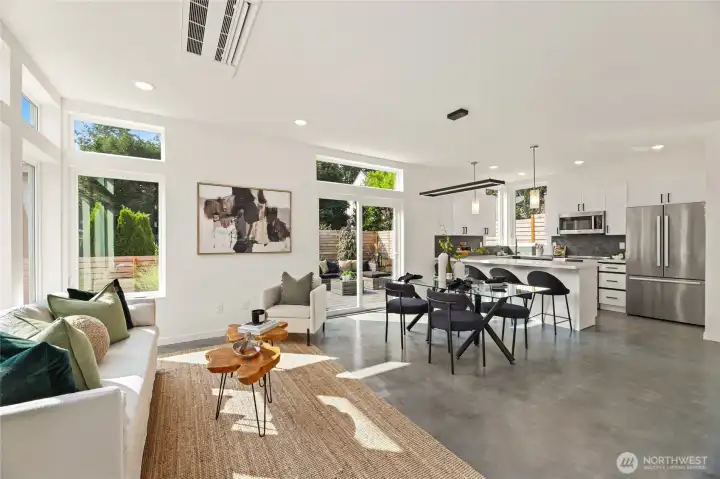 Large windows throughout fill the home with natural light.