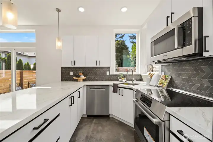 Well designed kitchen with ample counter space and cabinets for all your cooking needs.