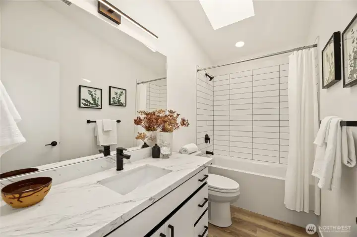 Large cabinet in bathroom for all of your essentials.