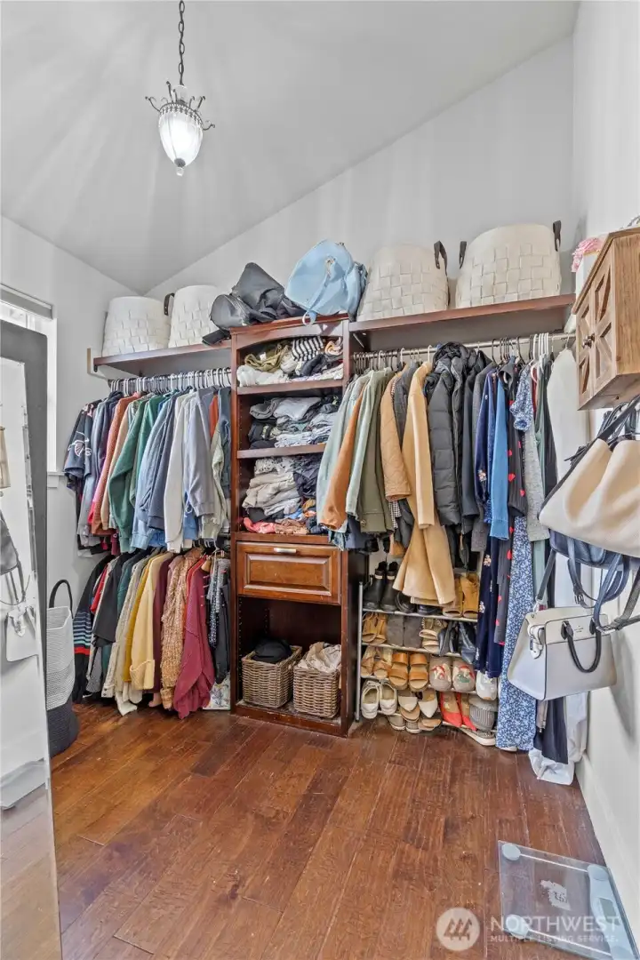 The primary suite includes a spacious walk-in closet.