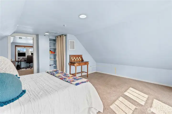 Upstairs you’ll find two additional rooms, providing flexible space for bedrooms, an office, or extra living area.