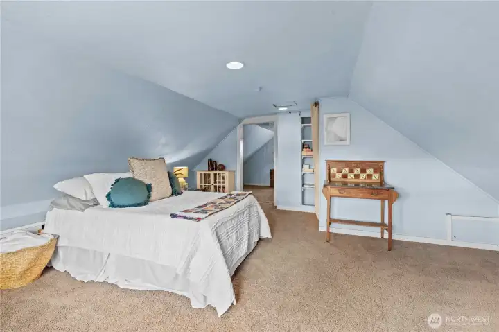 Upstairs you’ll find two additional rooms, providing flexible space for bedrooms, an office, or extra living area.