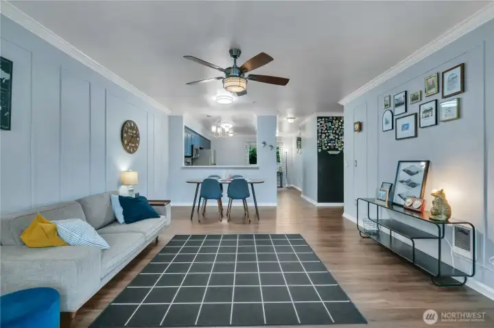 View from living room showing flexible space for dining in the living area or kitchen