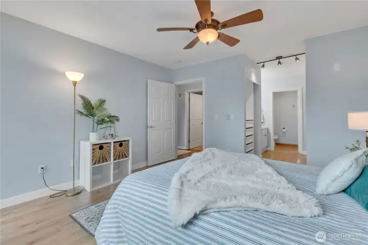 Corner view of primary bedroom