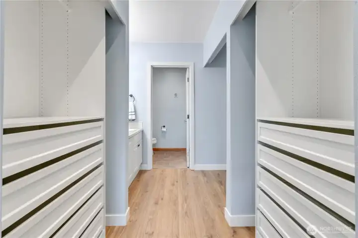 Multiple closets with built-ins