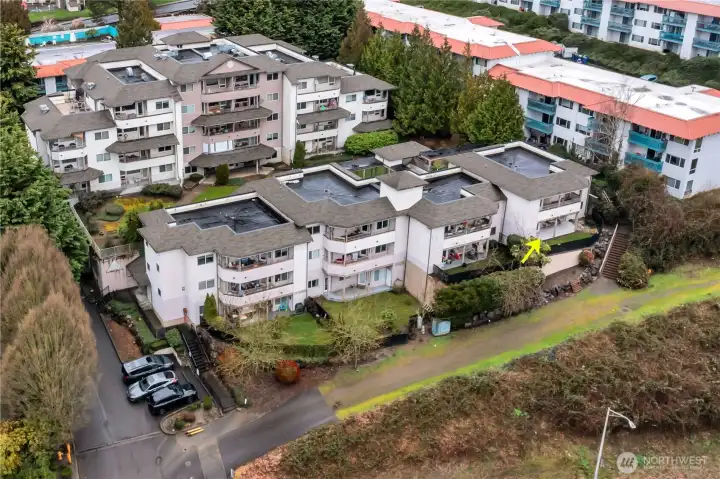 Charming fenced yard with HOA-maintained landscaping.