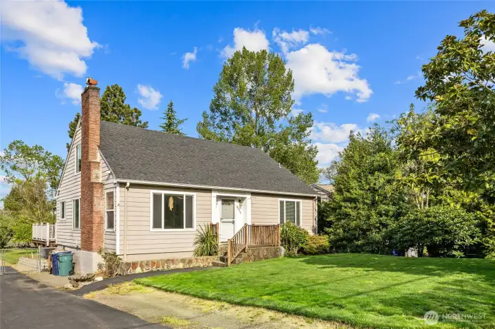 Welcome Home! This charming Tudor style home is ready to move in with almost 3000 sq ft and 1/2 an acre.