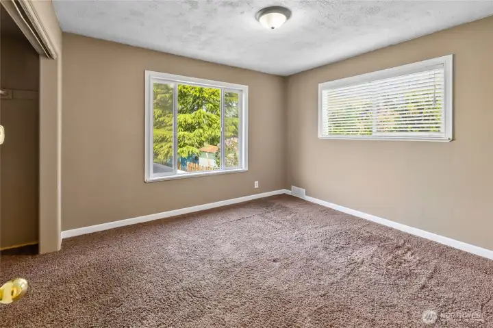 2nd bedroom on main floor, new paint and windows.