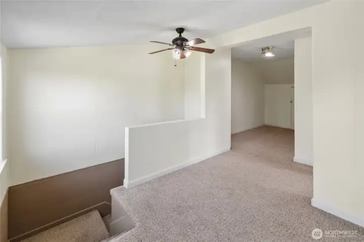 Landing area up the top of the stairs, new paint and plenty of room for office or sitting area to take in your backyard view.