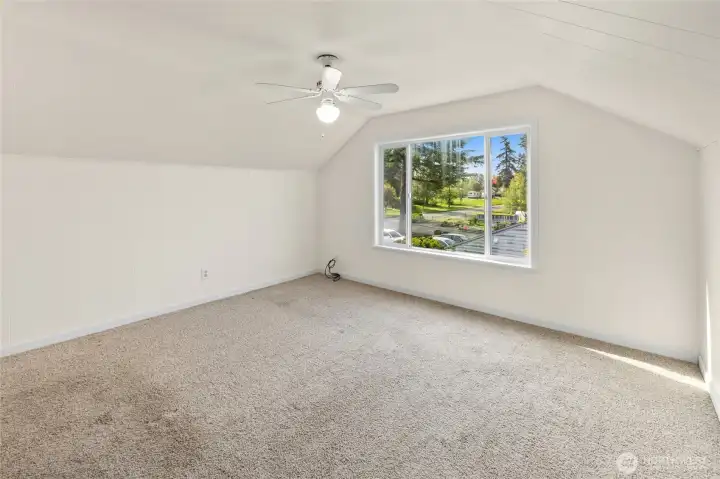 3rd Bedroom located upstairs, new paint and window.