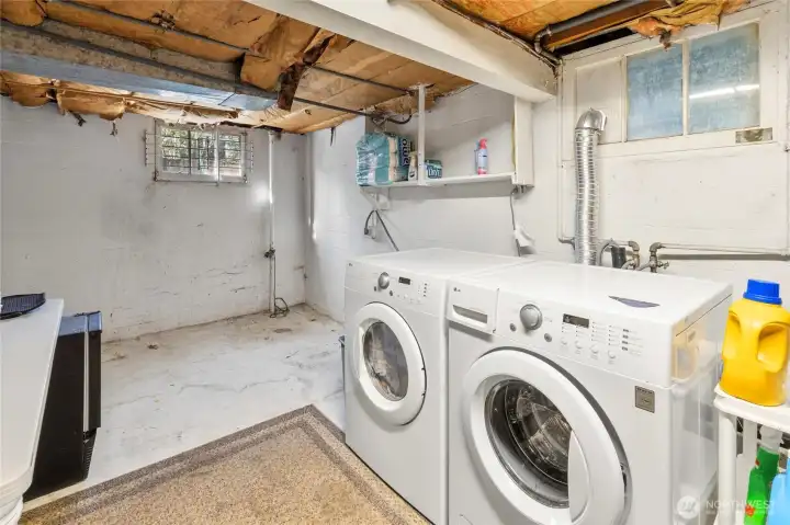 Laundry room in basement with more ROOM!