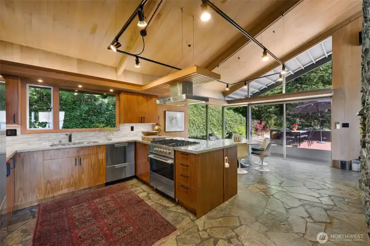 Stone floors and walnut cabinetry. Stone floors and walnut cabinetry.
