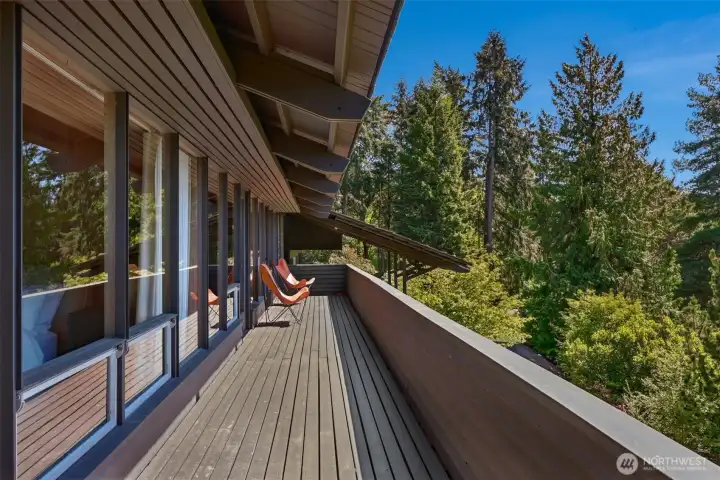 The full length west facing view deck, accessed individually by all three bedrooms. The full length west facing view deck, accessed individually by all three bedrooms.