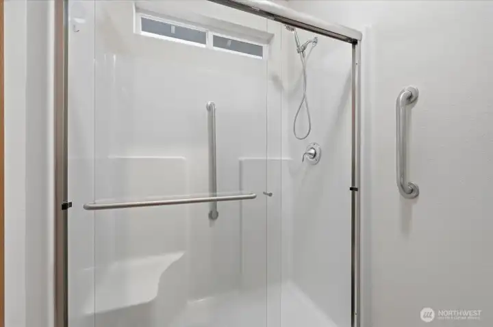 Primary ensuite features an oversized walk in shower.
