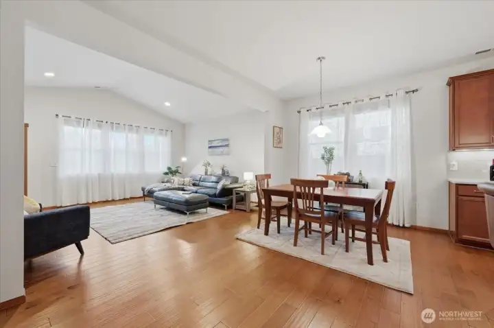 Dining room and living room - open floor plan. Light and bright with hardwood floors.