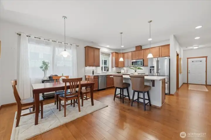 Looking toward the kitchen and entry way from the dining room.