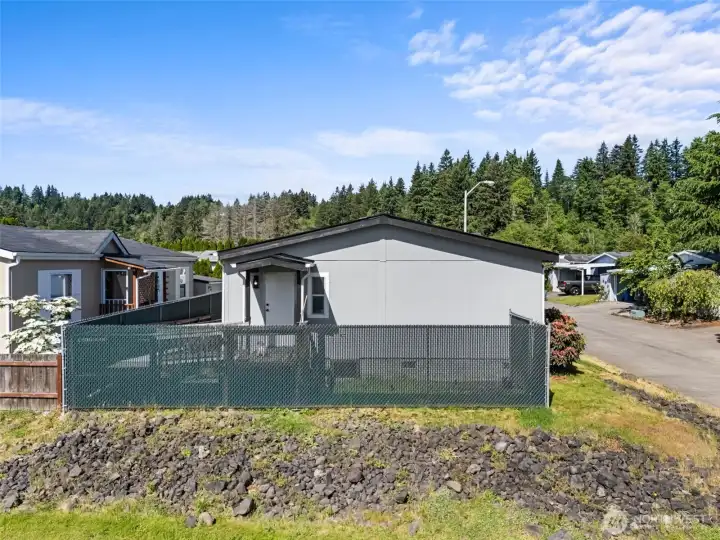 View of the back of the home showcasing added privacy with no homes directly behind. View of the back of the home showcasing added privacy with no homes directly behind.