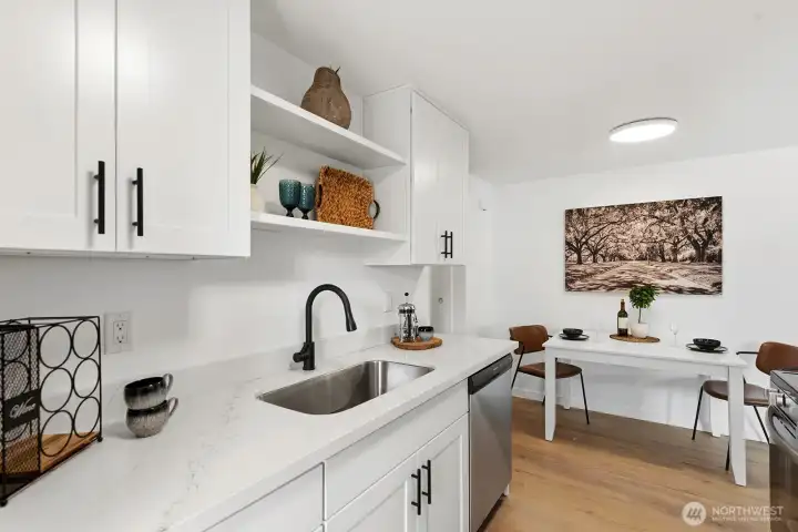 The open shelf design above the sink creates a perfect spot to showcase your favorite dishes or platters, decor pieces or framed photos adding personality and charm to the space.