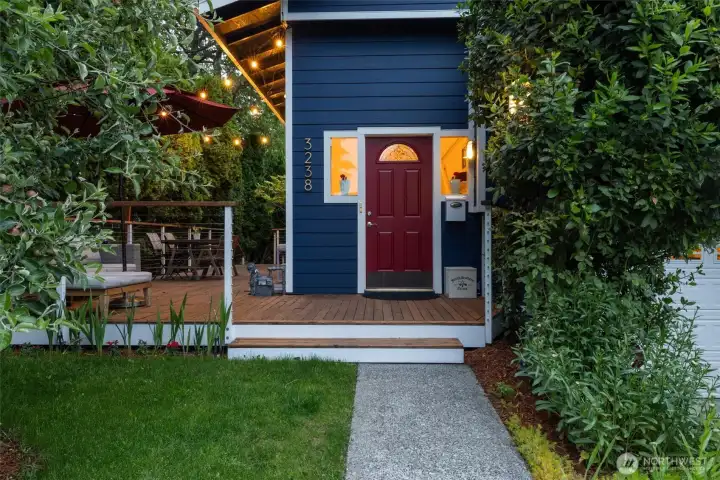 Welcoming entry with warm outdoor lighting