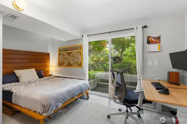 Downstairs bedroom with soft natural light