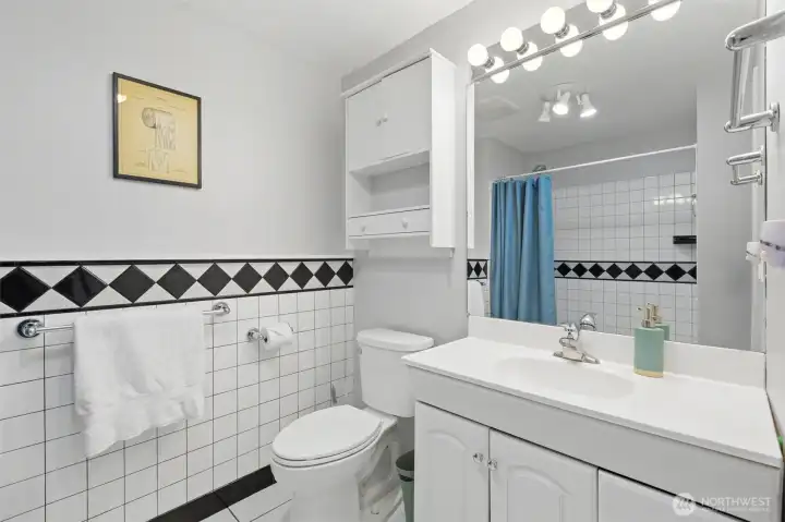 Bathroom with bright vanity lighting