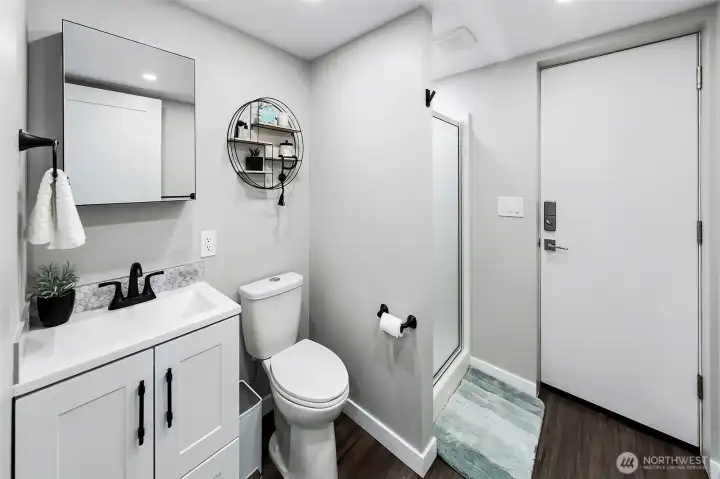 3/4 bathroom for downstairs suite. 3/4 bathroom for downstairs suite.