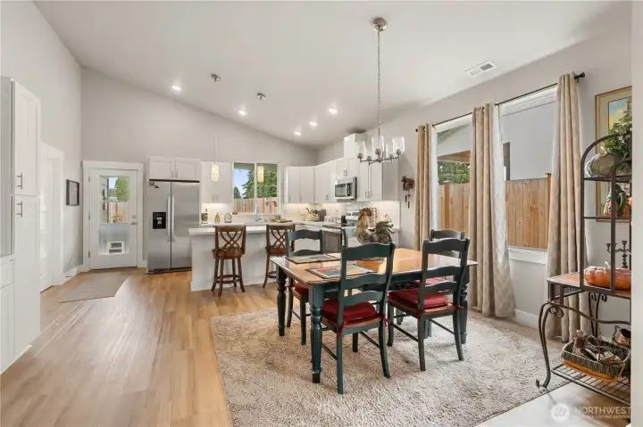 Bright Dining Space Flows Into Kitchen