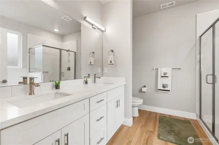 Primary Bathroom with Double Sinks and Walk-In Shower