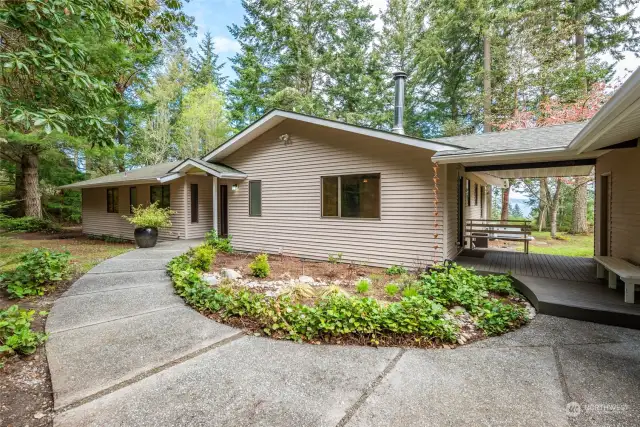Beautiful spacious single story home, nestled on 3+ acres with views to the water and Mt. Baker, a dream come true!