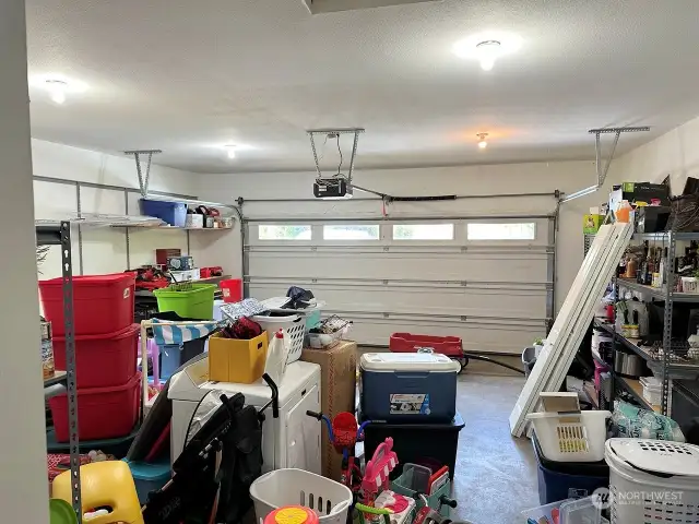 Double car garage with storage area.